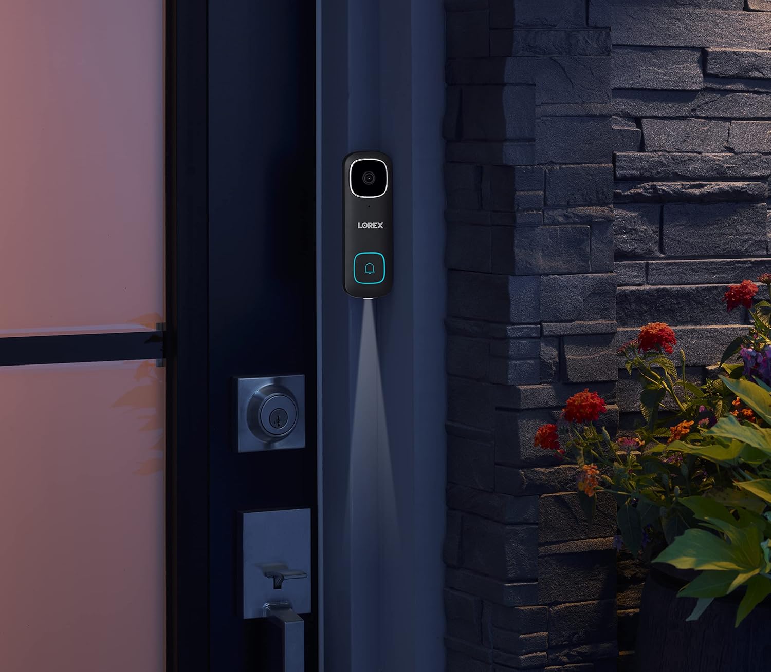 Modern smart doorbell installed on a house exterior at dusk.