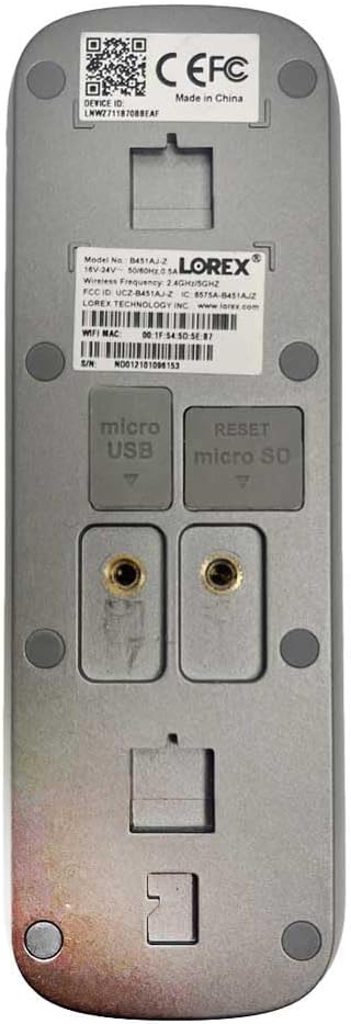 Close-up of a device's micro USB and micro SD ports with screws nearby.