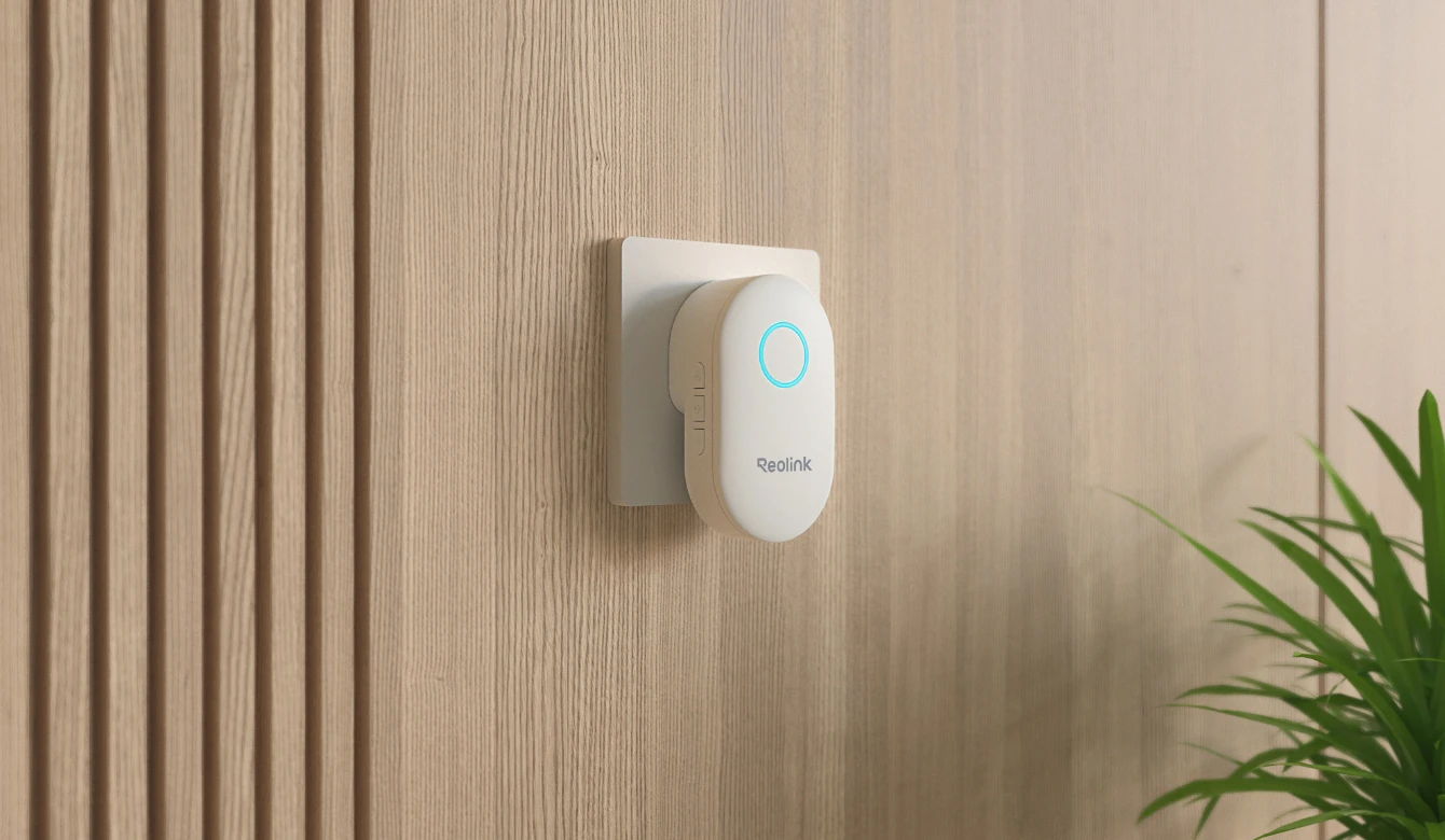Smart sensor device mounted on a wooden wall.