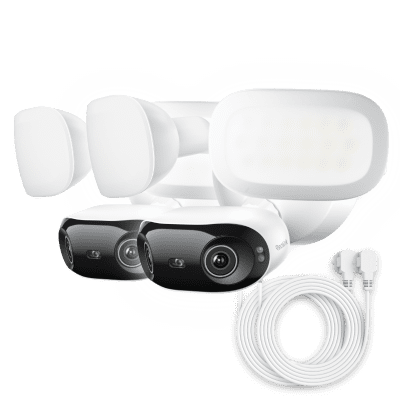 White smart home security camera with a ring attachment.