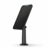 Sleek black smartphone mounted on an adjustable stand with a modern design.