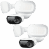 Two white outdoor security cameras with integrated lights.