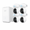 Home security system with four cameras and a central hub.