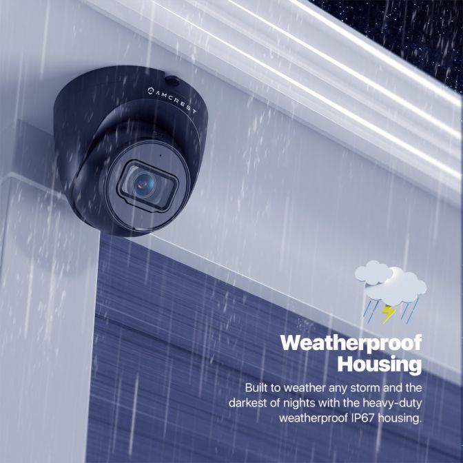 A weatherproof security camera mounted on a white ceiling.